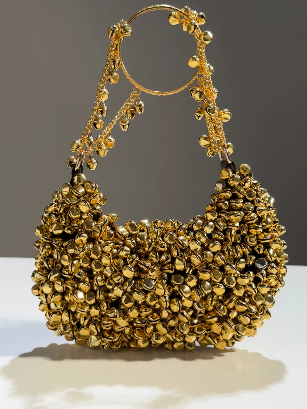 The Ghungroo Crescent Bag – Gold Luxe Edition