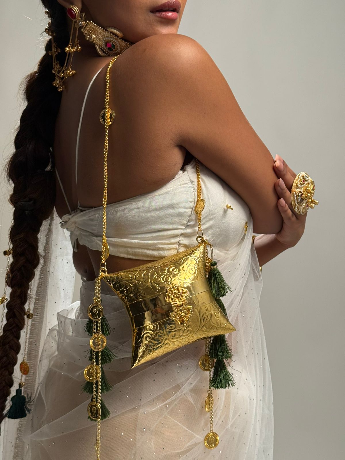 Gold embossed box bag with green tassels – Zara Royale by Clutch It